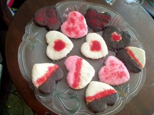 Glazed painted heart powdered sugar cookies with colored sugar Glazed painted heart powdered sugar cookies with colored sugar
