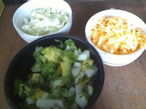 chim_toppings Topping for tacos - chopped avocado, cilantro and onion; chopped cabbage, shredded cheese