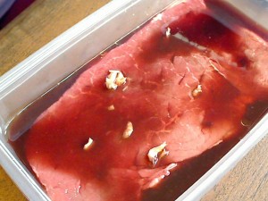 lbroil_marinating Garlic studded London Broil Marinating in Red Wine