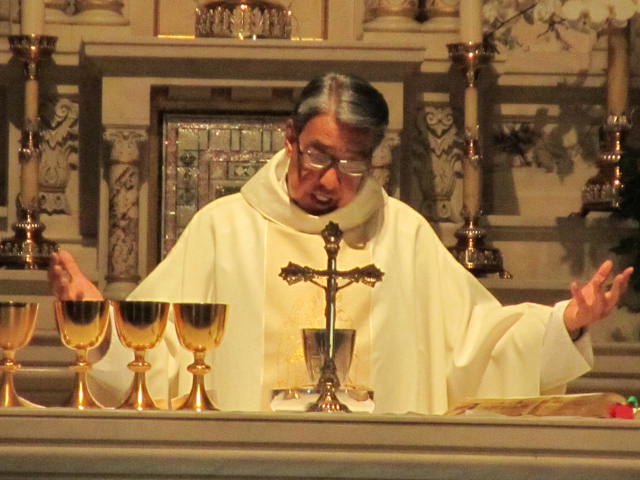 Fr. Juan says Mass at Holy Family Catholic Community