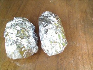 potatoes wrapped in foil, ready for the bbq