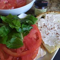 Open faced tomato salad sandwich is gourmet food on a budget