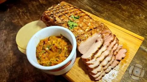 Chili Crusted Pork Roast Served